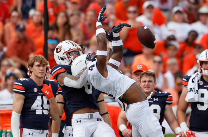 Sep 17, 2022; Auburn, Alabama, USA; Auburn Tigers wide receiver Dazalin Worsham (8) keeps Penn State Nittany Lions cornerback Kalen King (4) from the ball during the first quarter at Jordan-Hare Stadium. Mandatory Credit: John Reed-USA TODAY Sports